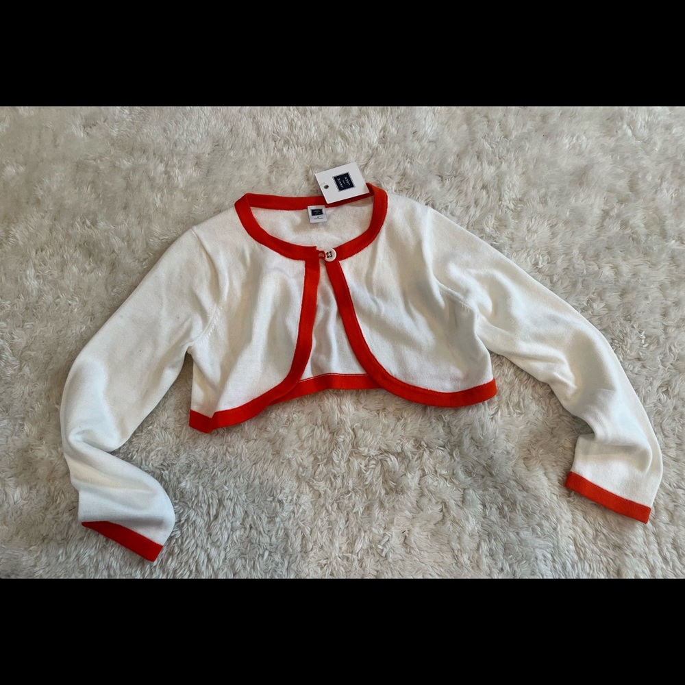Orange and white bolero
